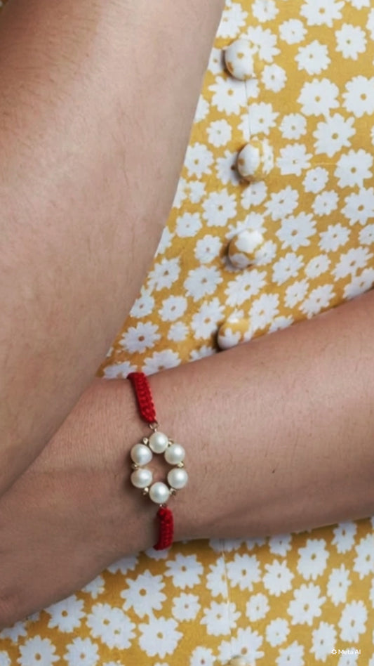 Cordon en Or 18k avec perle naturelle.